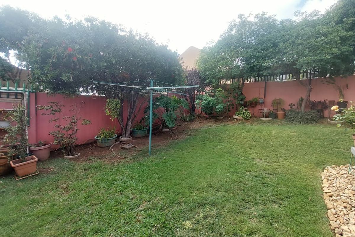 Charming 3-Bed Home with Backyard Oasis! - Photo 3