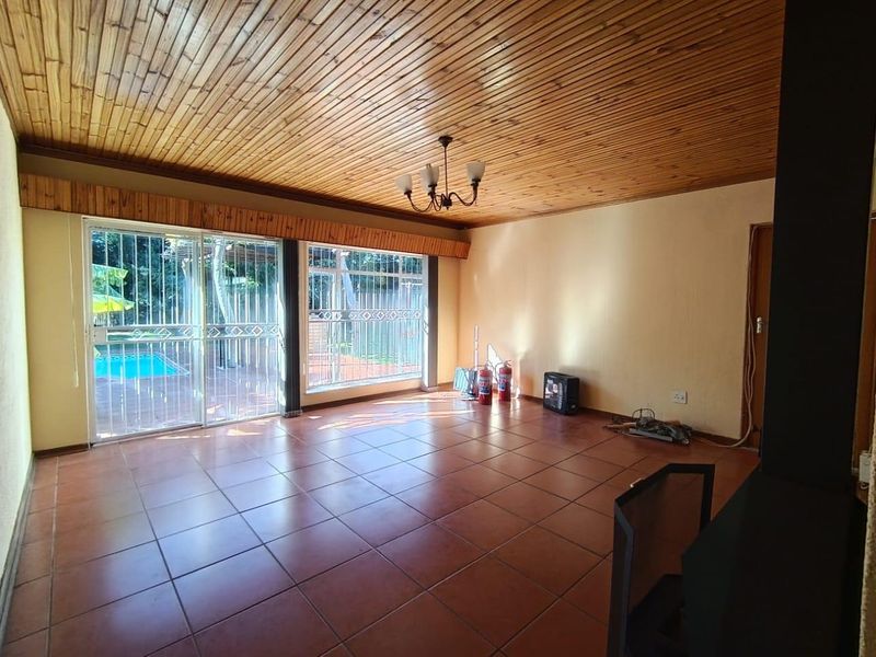 Spacious 5-Bedroom Home with Pool and Versatile Living Options - Photo 6