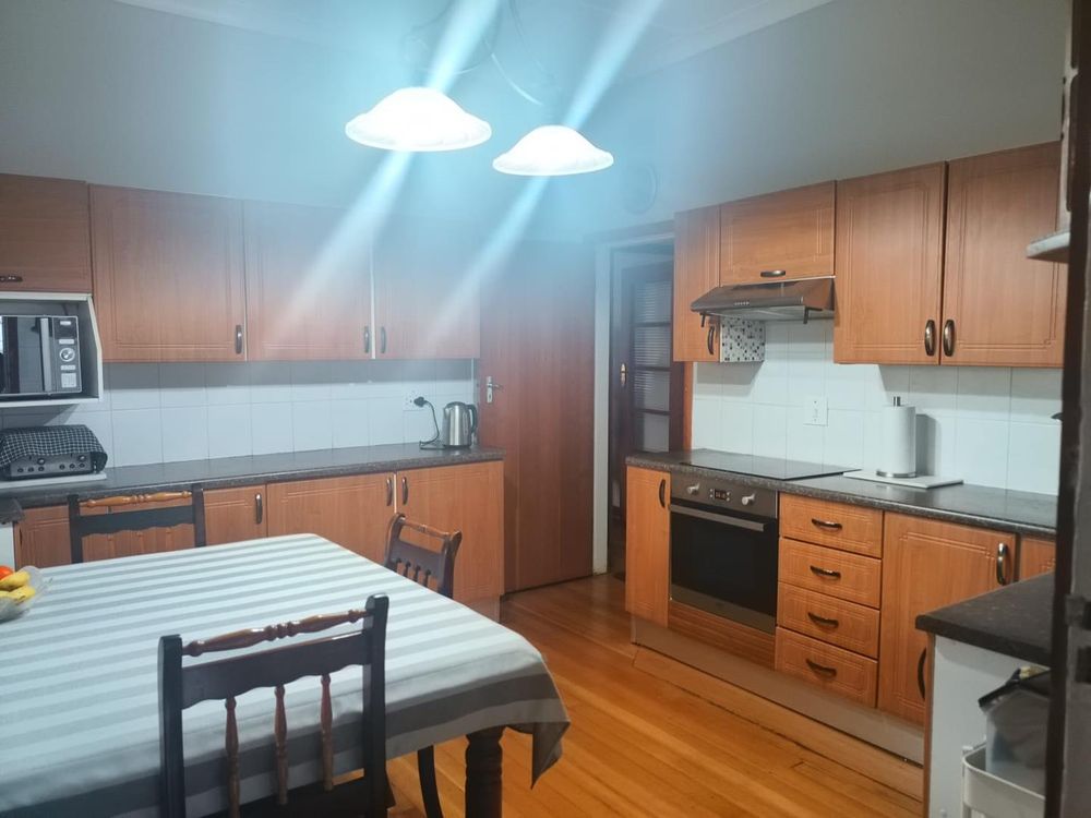 The spacious kitchen has a breakfast nook