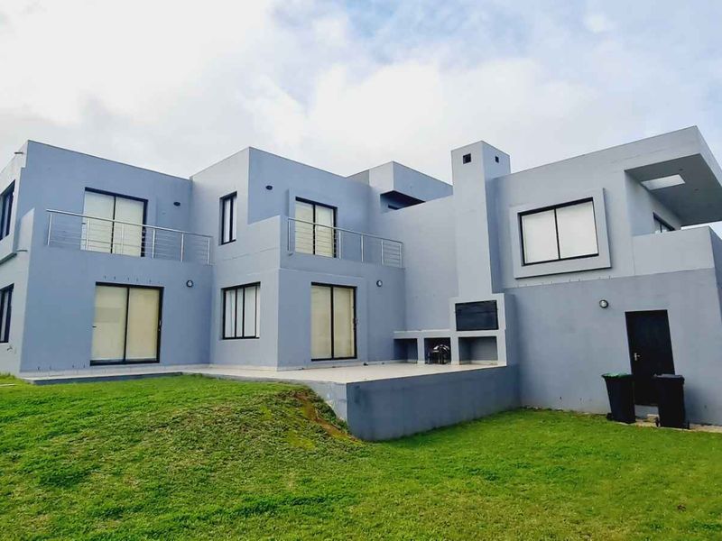 Elegant Family Living with Spectacular De Grendel Wine Farm Views - Photo 4