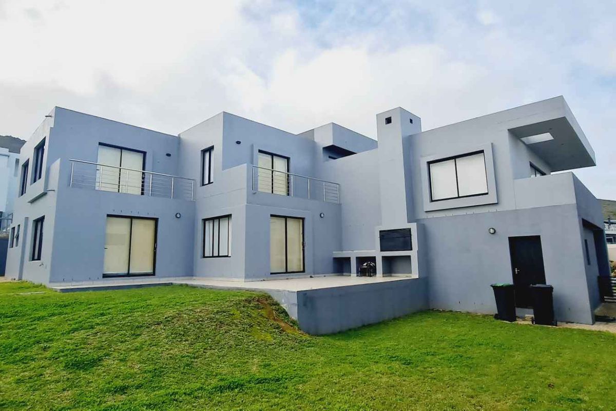 Elegant Family Living with Spectacular De Grendel Wine Farm Views - Photo 4