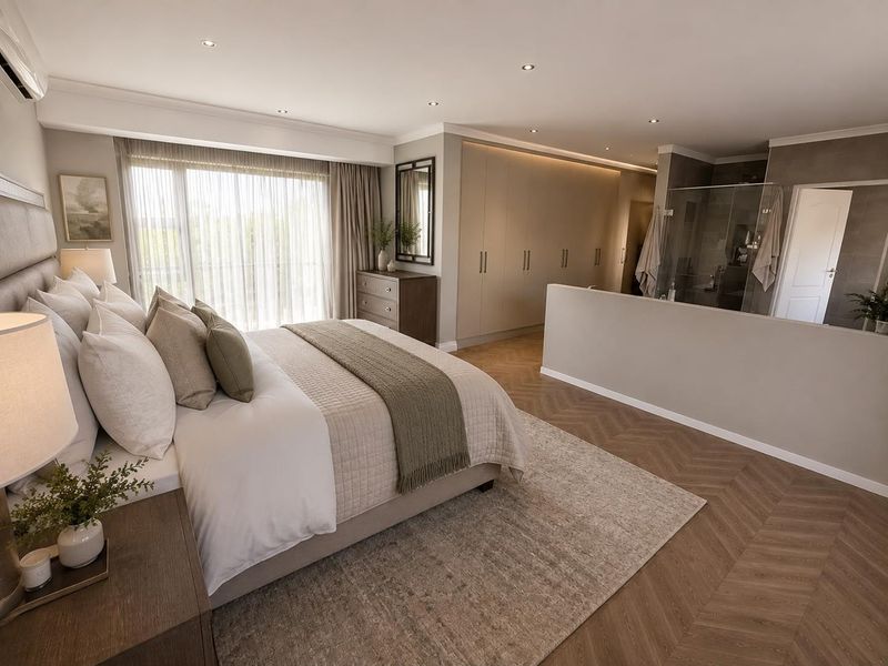 Spacious master bedroom featuring herringbone flooring, extensive built-in cabinetry, and an open-plan en-suite bathroom with a modern glass shower enclosure.