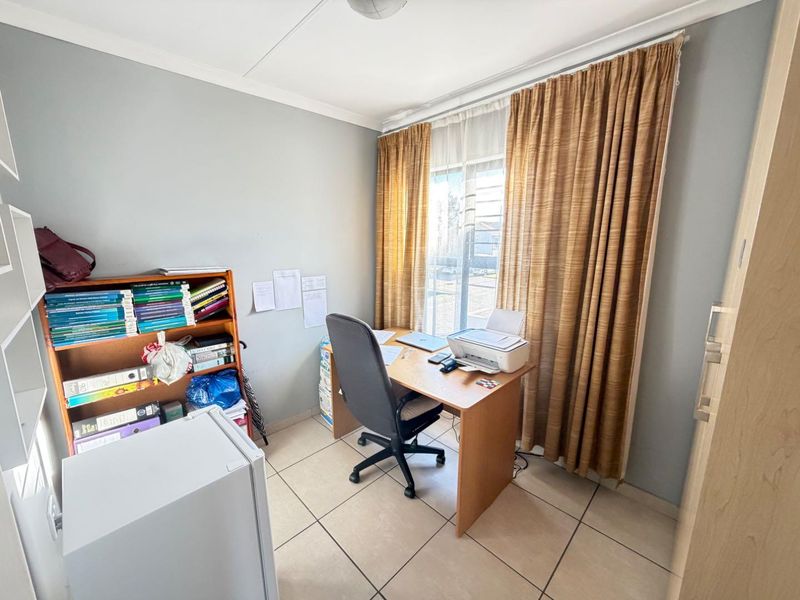 Convenient Location! Secure 2-Bedroom Apartment for Sale - Photo 10