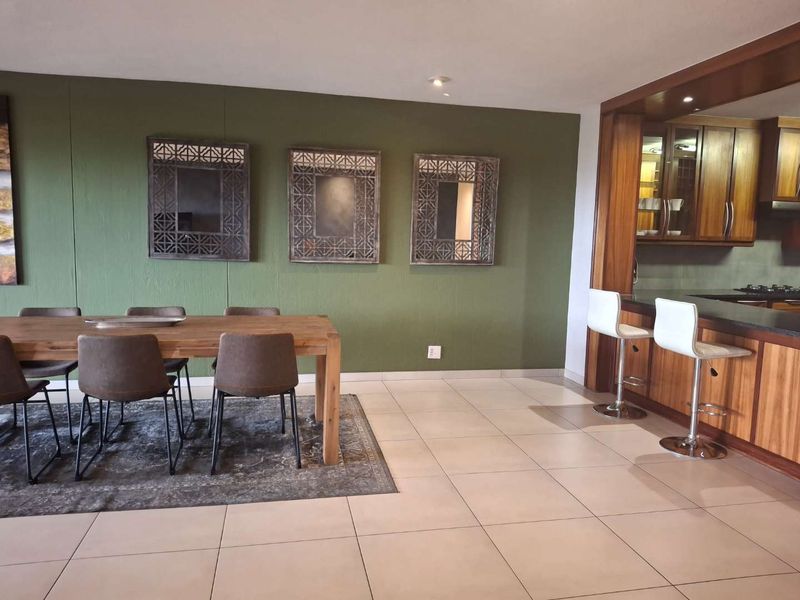 A BEAUTIFULLY FURNISHED THREE BEDROOM APARTMENT - Photo 5
