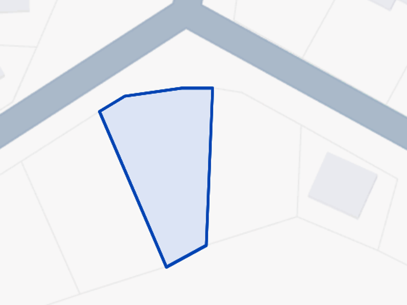 A digital map view highlighting the boundaries of the vacant residential land plot.