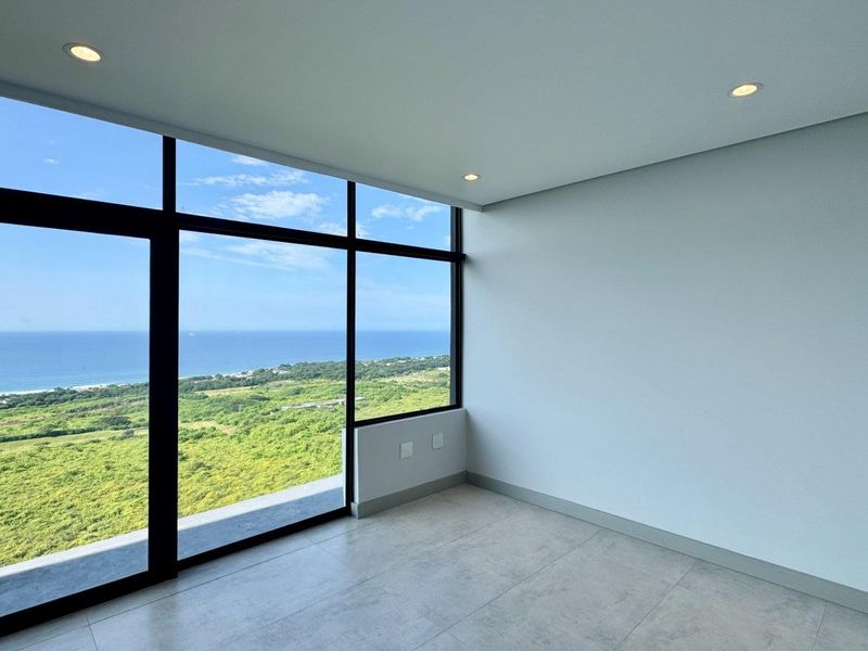 This is a premium, move-in-ready coastal apartment that combines luxury, security, and modern convenience in a sleek, never-before-lived-in space. - Photo 10