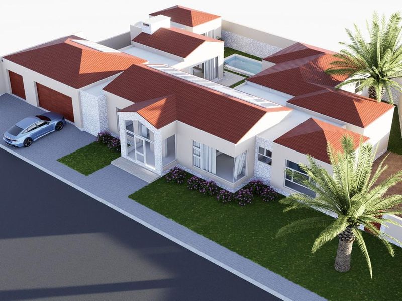An aerial view of a modern residential property featuring a tiled roof, attached garage, private swimming pool, and landscaped garden area.