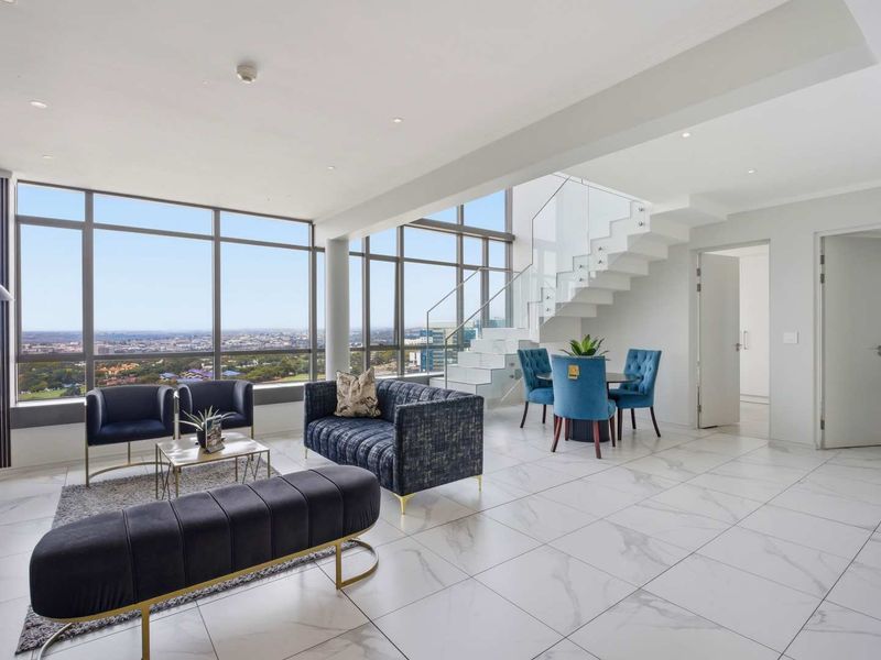 Sky-High Living: Stunning Sandton Penthouse with Panoramic Views - Photo 6