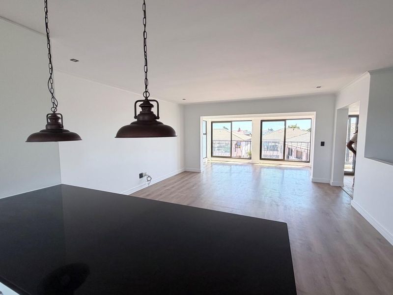 Modern Three-Bedroom Triplex in Island View, La Paloma – With Table Mountain Views - Photo 4