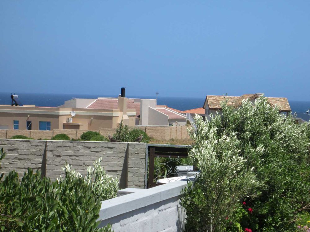 View in direction of Sea - via gap in between us and the 2 Houses in front of us.