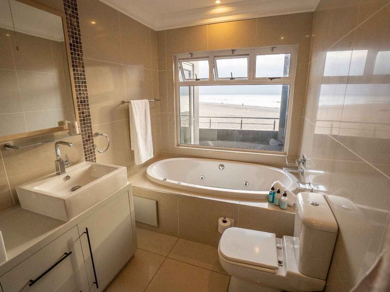 Beachfront Investment Opportunity – Fully Furnished & Airbnb-Ready - Photo 3