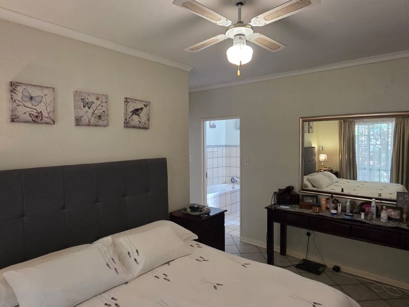 🏡 A MUST-SEE FAMILY HOME IN A PEACEFUL NELSPRUIT LOCATION! - Photo 9