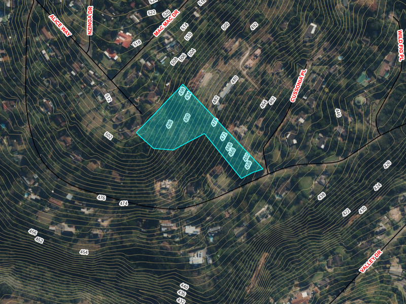 An aerial view of the vacant residential land plot with topographical contour lines and property boundary markers overlaid on the landscape.
