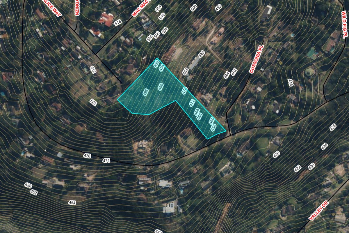 An aerial view of the vacant residential land plot with topographical contour lines and property boundary markers overlaid on the landscape.