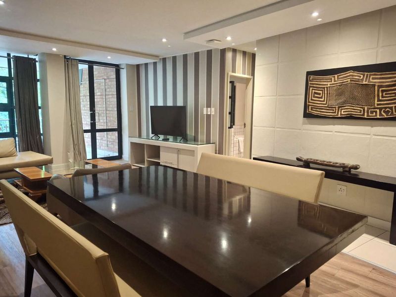 A TASTEFULLY FURNISHED TWO BEDROOM APARTMENT - Photo 3