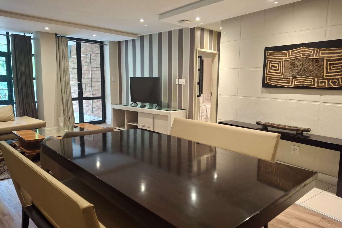 A TASTEFULLY FURNISHED TWO BEDROOM APARTMENT - Photo 3