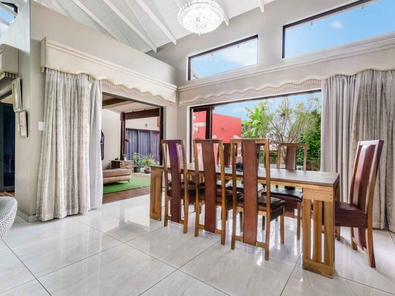 LIFE WITH LUXURY, INDULGENCE AND CONVENIENCE, THIS CHIC HOME IS A MUST SEE - Photo 6