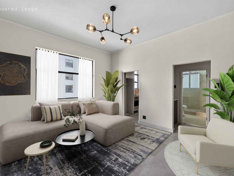 A bright and modern living room featuring contemporary lighting and tiled flooring, with views into adjacent rooms.