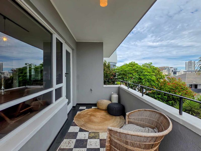 North east facing corner apartment with two balconies and automated garage | Sea Point - Photo 7