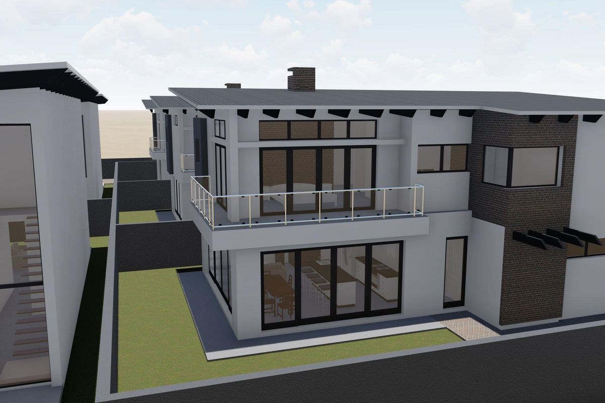 An aerial perspective of a modern townhouse development featuring contemporary architectural design, clean lines, and integrated outdoor balcony and patio spaces.