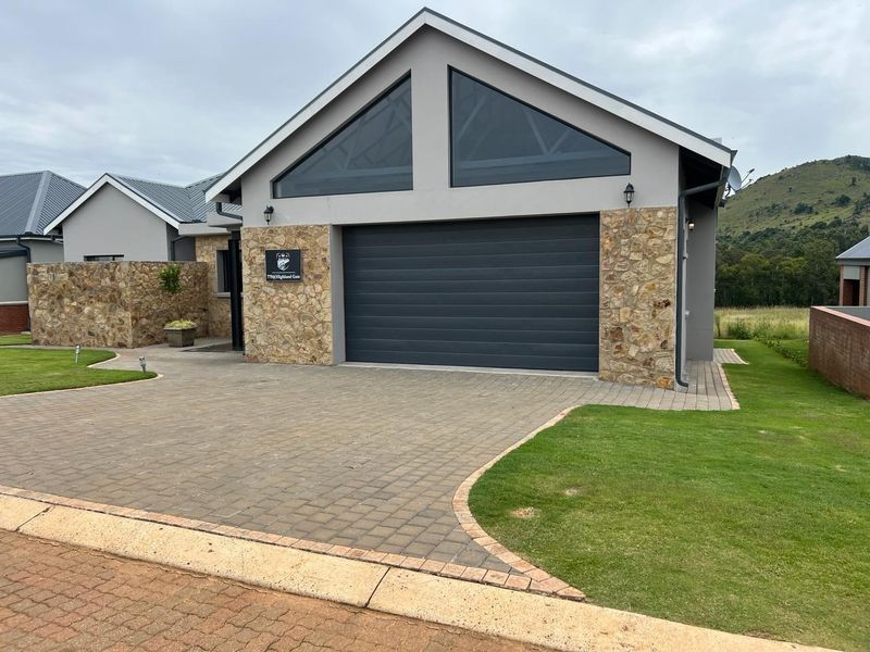 INCOME GENERATING HOME Welcome to this charming 4 bedroom home nestled within Highland Gate Golf Estate - Photo 3