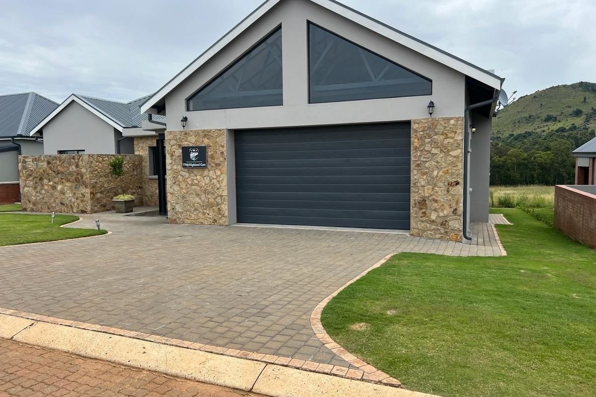 INCOME GENERATING HOME Welcome to this charming 4 bedroom home nestled within Highland Gate Golf Estate - Photo 3