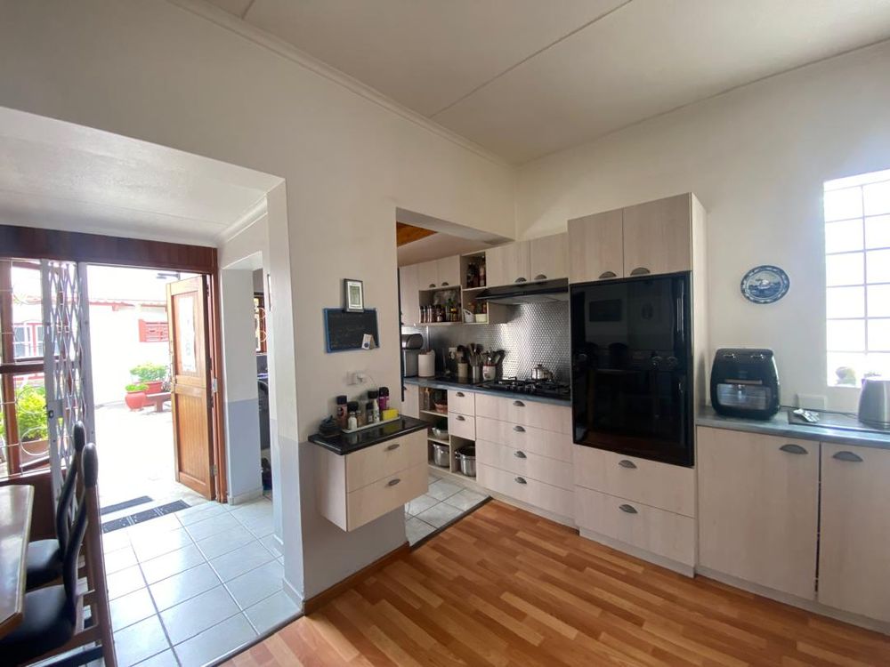 Main house kitchen and door leading to the inner courtyard 