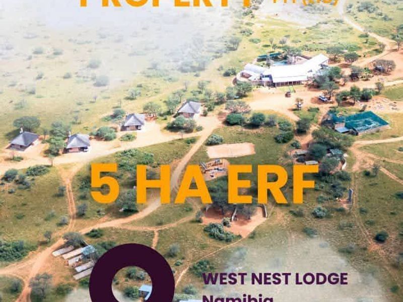 Aerial view of a 5-hectare residential erf featuring multiple detached lodge-style buildings set within a natural landscape.