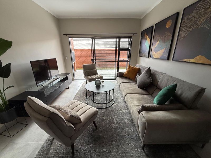 Sophisticated 3-Bedroom Simplex with Double Garage and Private Garden Sanctuary - Photo 10