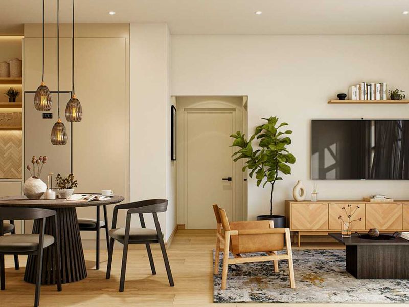 Modern open-plan living area featuring a contemporary kitchen with herringbone backsplash, integrated cabinetry, and seamless flow to a bright lounge with sliding door access.