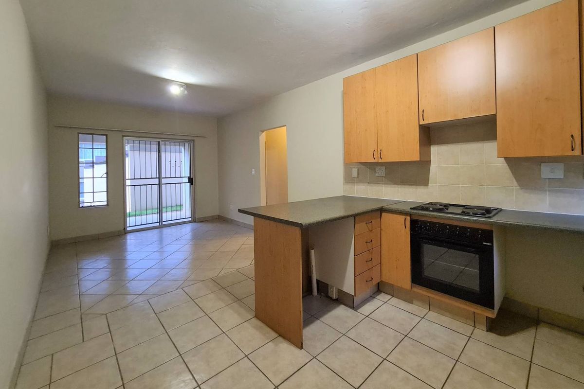 Loadshedding-Free Area – A Perfect Lock-Up and Go! - Photo 2