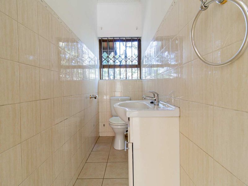 Elegant Face Brick Home with Solar Pool & Built-In Braai - Photo 8