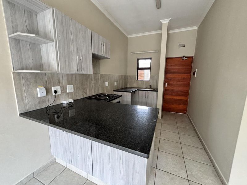 2 Bedroom unit in a secure, well-managed complex. - Photo 2