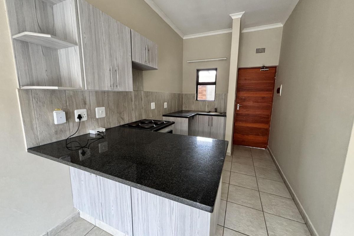 2 Bedroom unit in a secure, well-managed complex. - Photo 2