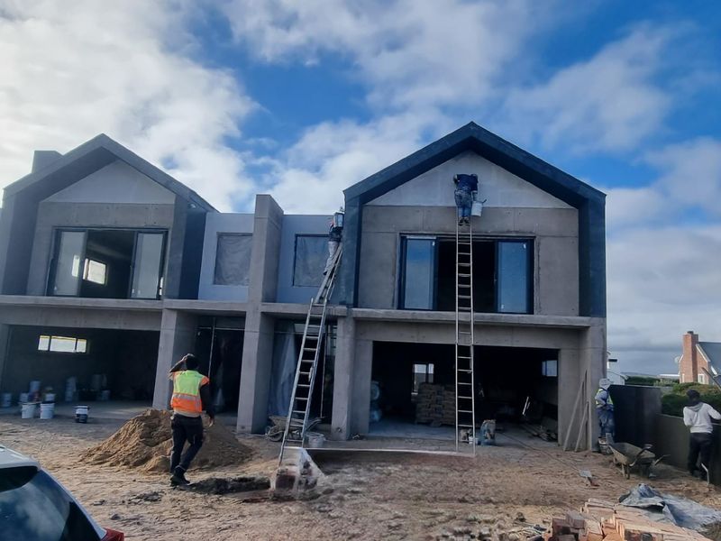 SUNBIRD 8A – Flexible Coastal Living with Exceptional Design - Photo 3