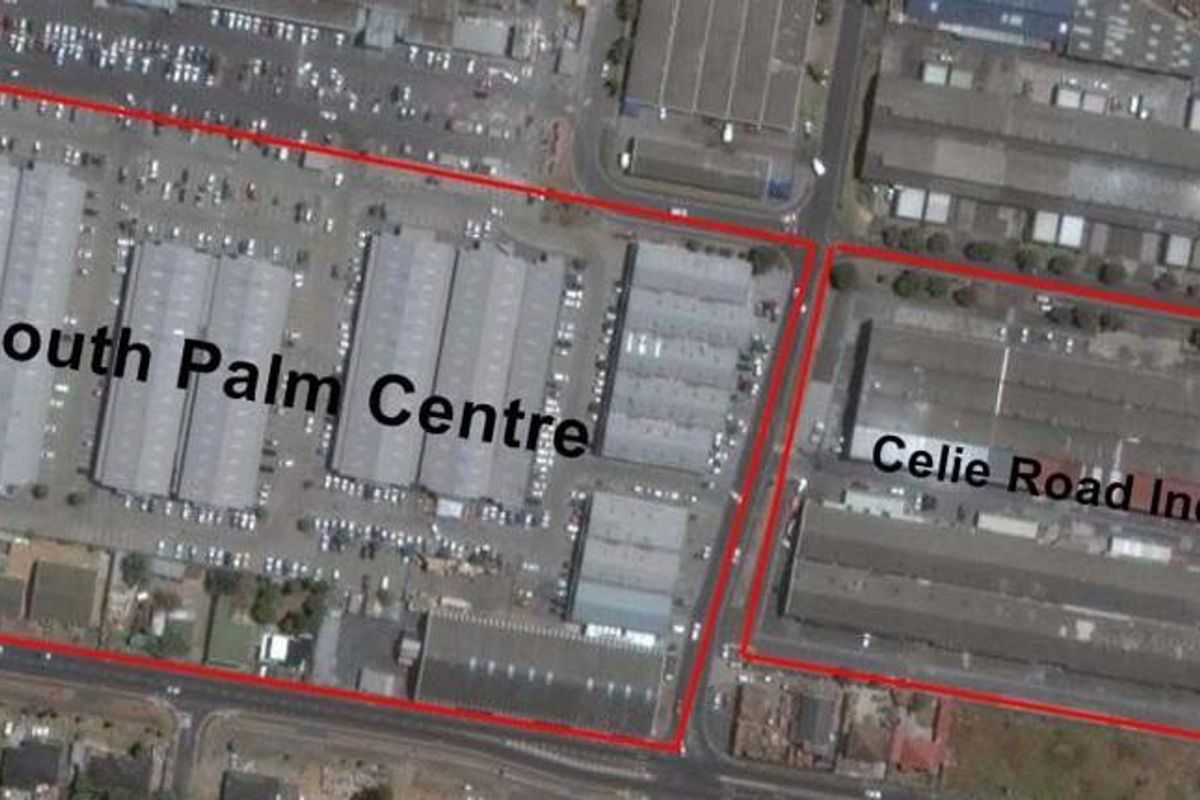 Aerial view of the South Palm Centre and Celie Road Industrial complex, showcasing the layout of the commercial buildings and surrounding parking facilities.