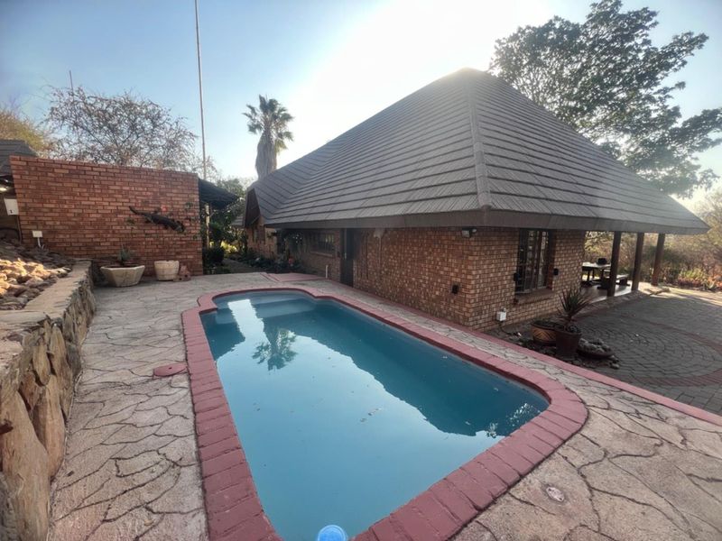 Expansive Property with Main House & Income-Generating Second Property - Photo 4