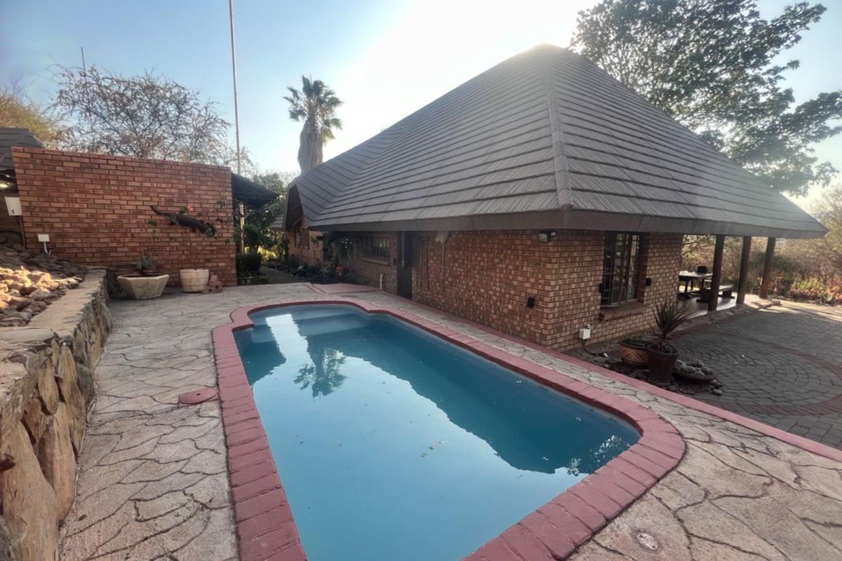 Expansive Property with Main House & Income-Generating Second Property - Photo 4