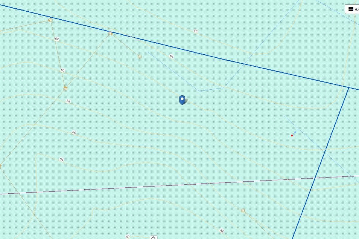 A digital topographic map showing land contours and property boundaries for the vacant residential plot.