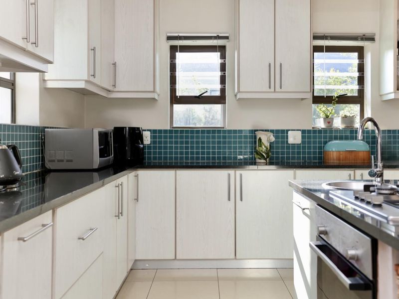 Charming Double-Storey Family Home in a Secure Lifestyle Estate - Photo 10