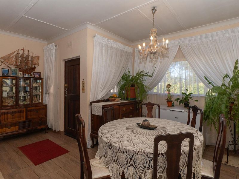 Charming 3-Bedroom Family Home with Income-Generating Bachelor Cottage in Birchleigh - Photo 6