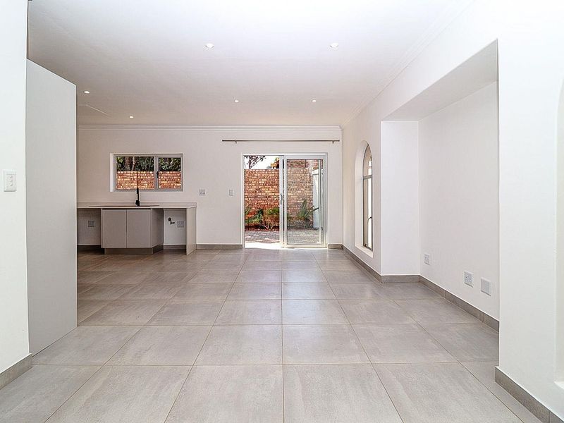 Modern Comfort Meets Secure Garden Living! - Photo 6