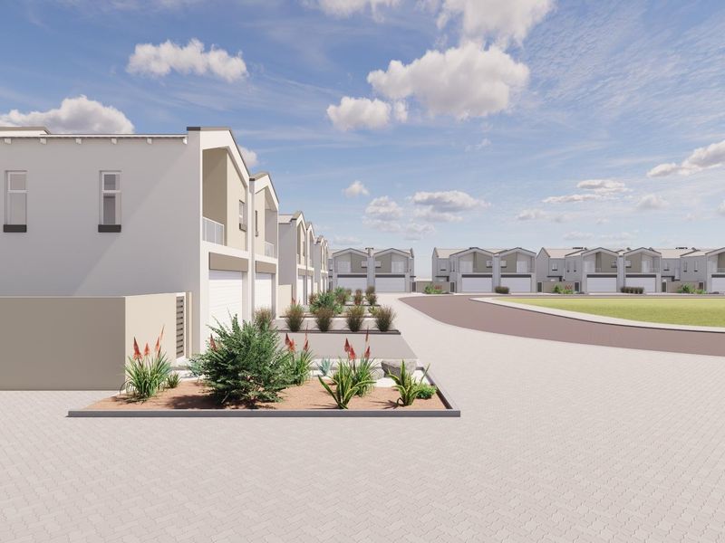 A modern townhouse development featuring paved driveways, integrated garage doors, and landscaped garden beds in a clean, contemporary residential estate setting.