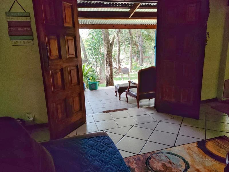 Charming Sunlit Home with Lush Garden in Prime Location - Photo 9