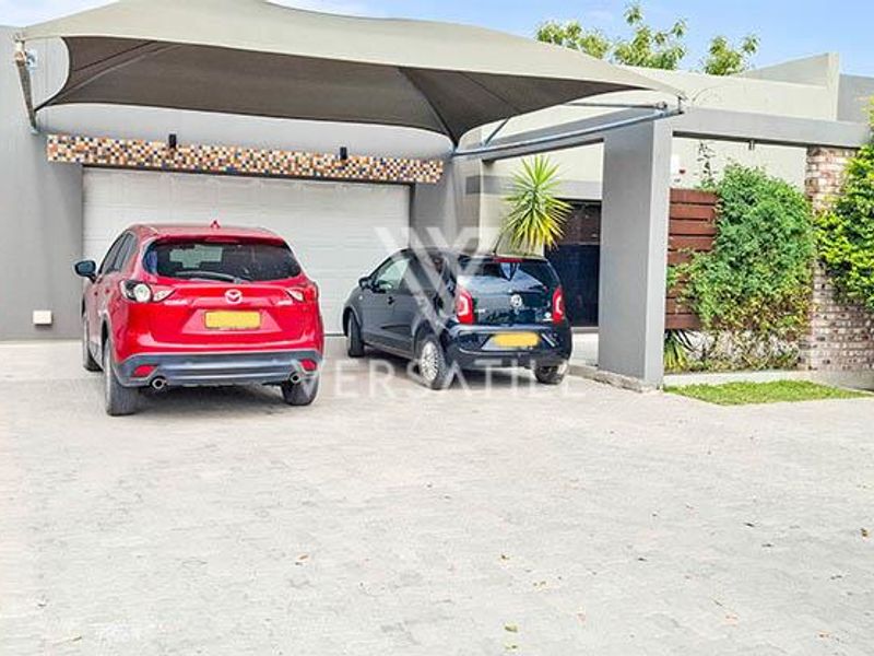 Exceptional Family Home with a Pool, Directly Across from Oshana Gymnasium. - Photo 6