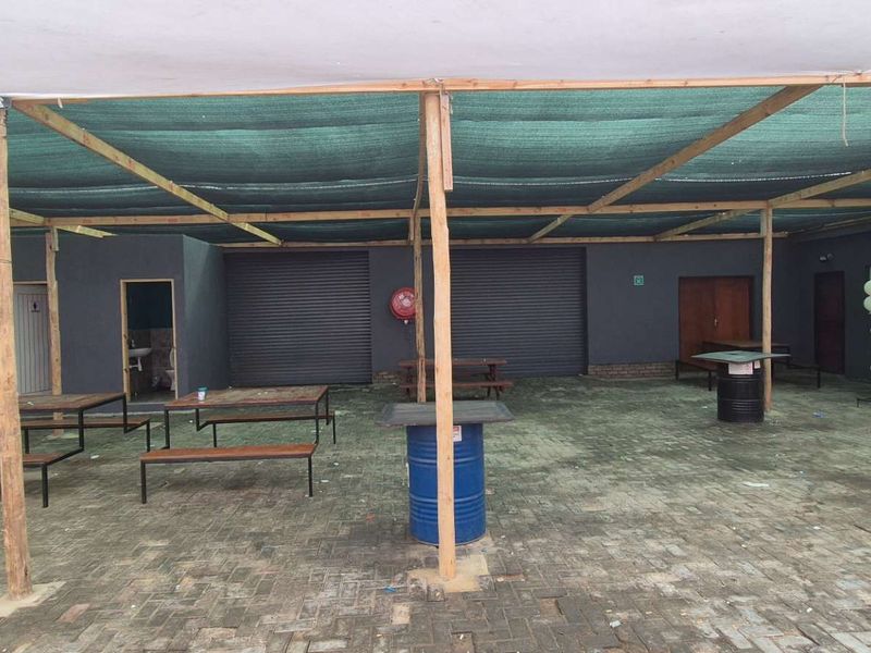 Discover the perfect blend of residential and commercial space with this versatile property - Photo 2