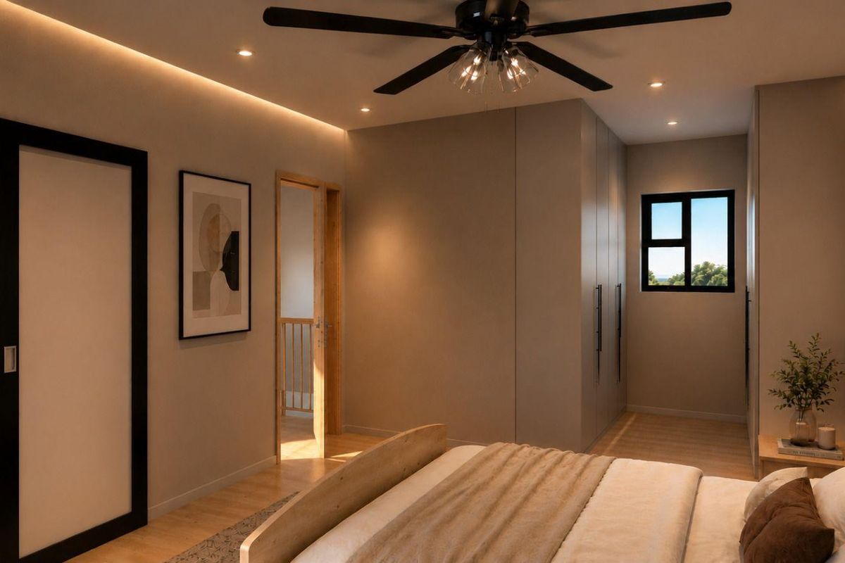 Modern bedroom featuring built-in cupboards, timber flooring, recessed and cove lighting, and a ceiling fan.