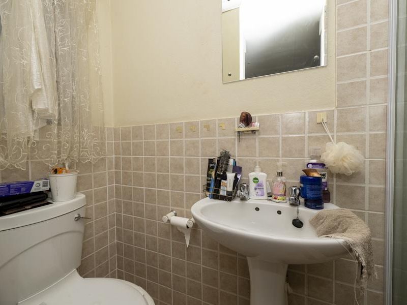 SECURE LIVING WITH POTENTIAL: 2-BEDROOM HOME WITH CHARM - Photo 10