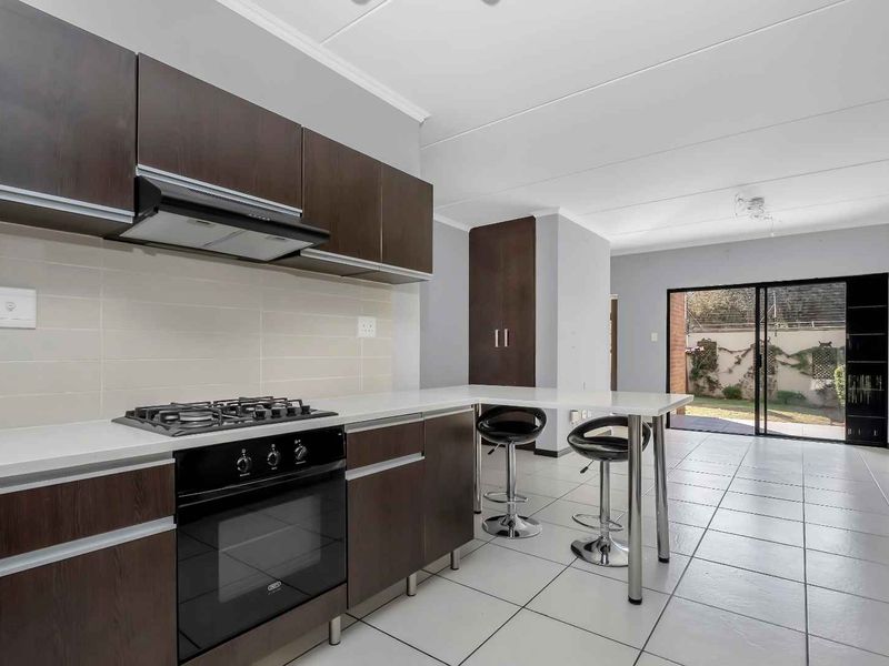 LOCK-UP AND GO LIVING AT ITS FINEST! - Photo 2