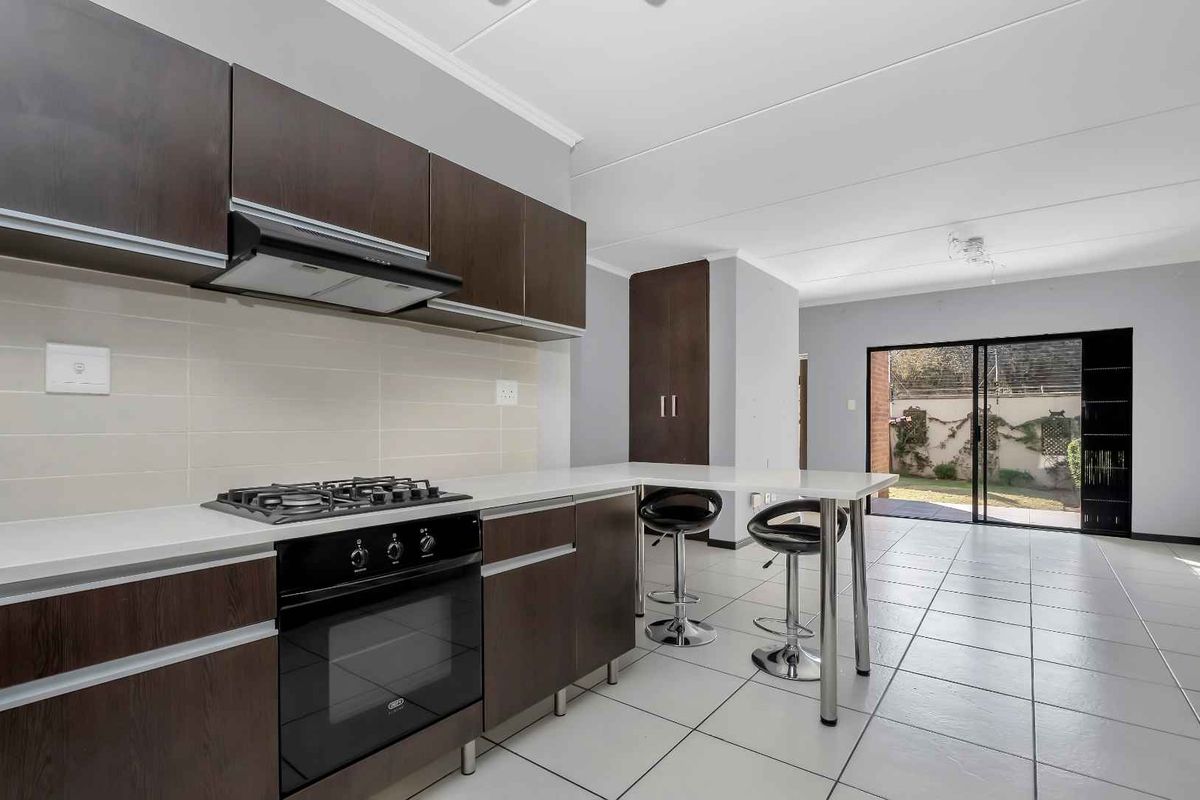LOCK-UP AND GO LIVING AT ITS FINEST! - Photo 2